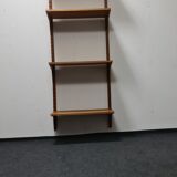 Vintage teak wall system by Poul Cadovious