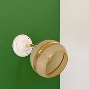 Vintage globe wall light in frosted yellow and gold glass.