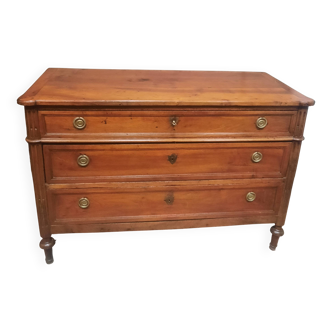 Natural wood commode from the Louis XVI period.