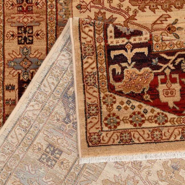 Traditional beige and black oriental rug