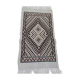 White carpet with multicolored Berber patterns handmade