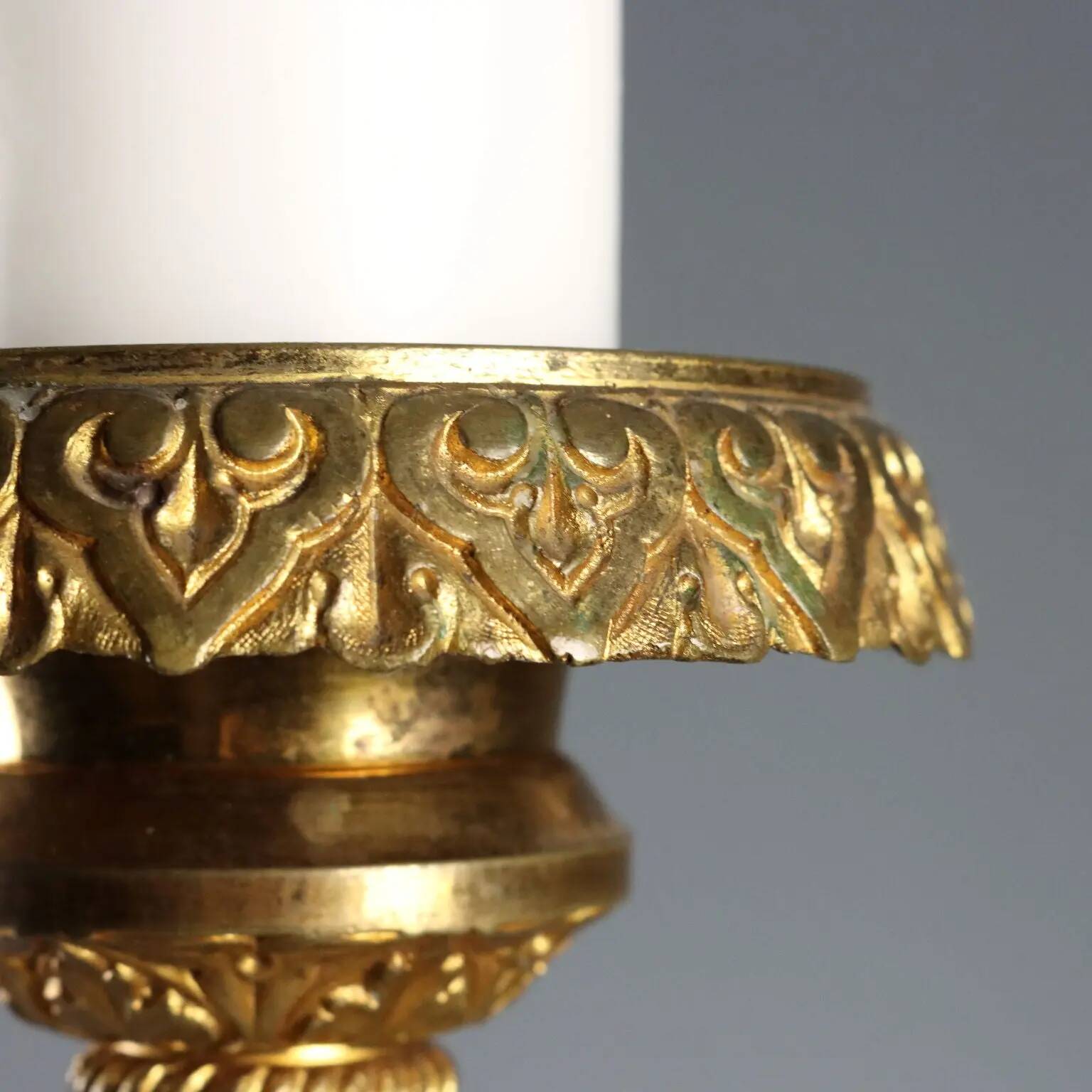 Antique gilded bronze candelabrum, 19th-century decorations.