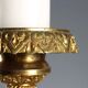 Antique gilded bronze candelabrum, 19th-century decorations.
