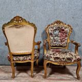 Pair of Louis XV style Baroque armchairs in gilded and carved wood circa 1900