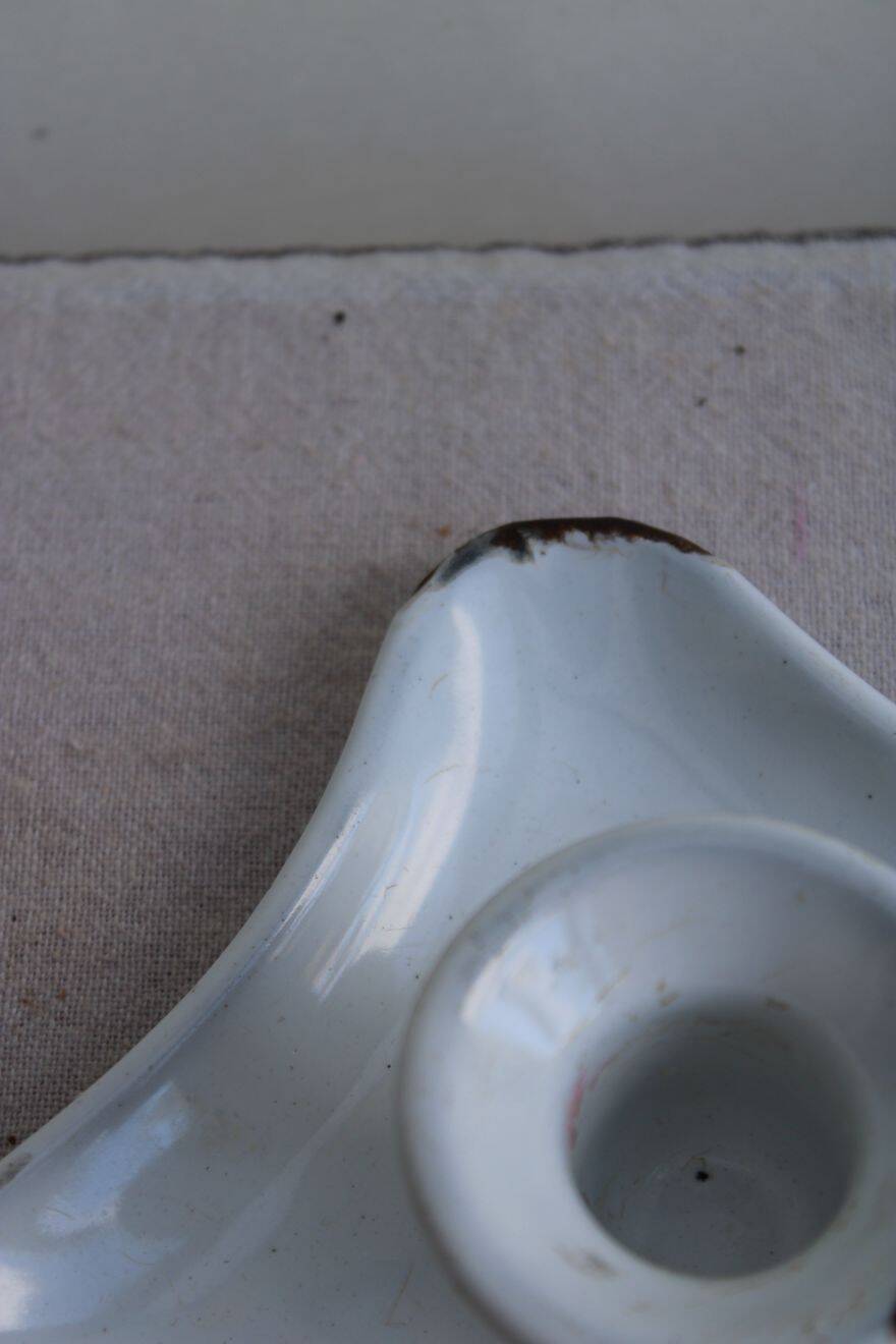 Antique enamel candle holder