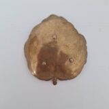 Vintage brass pocket emptier