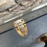 Midnight blue suitcase of representative 30s