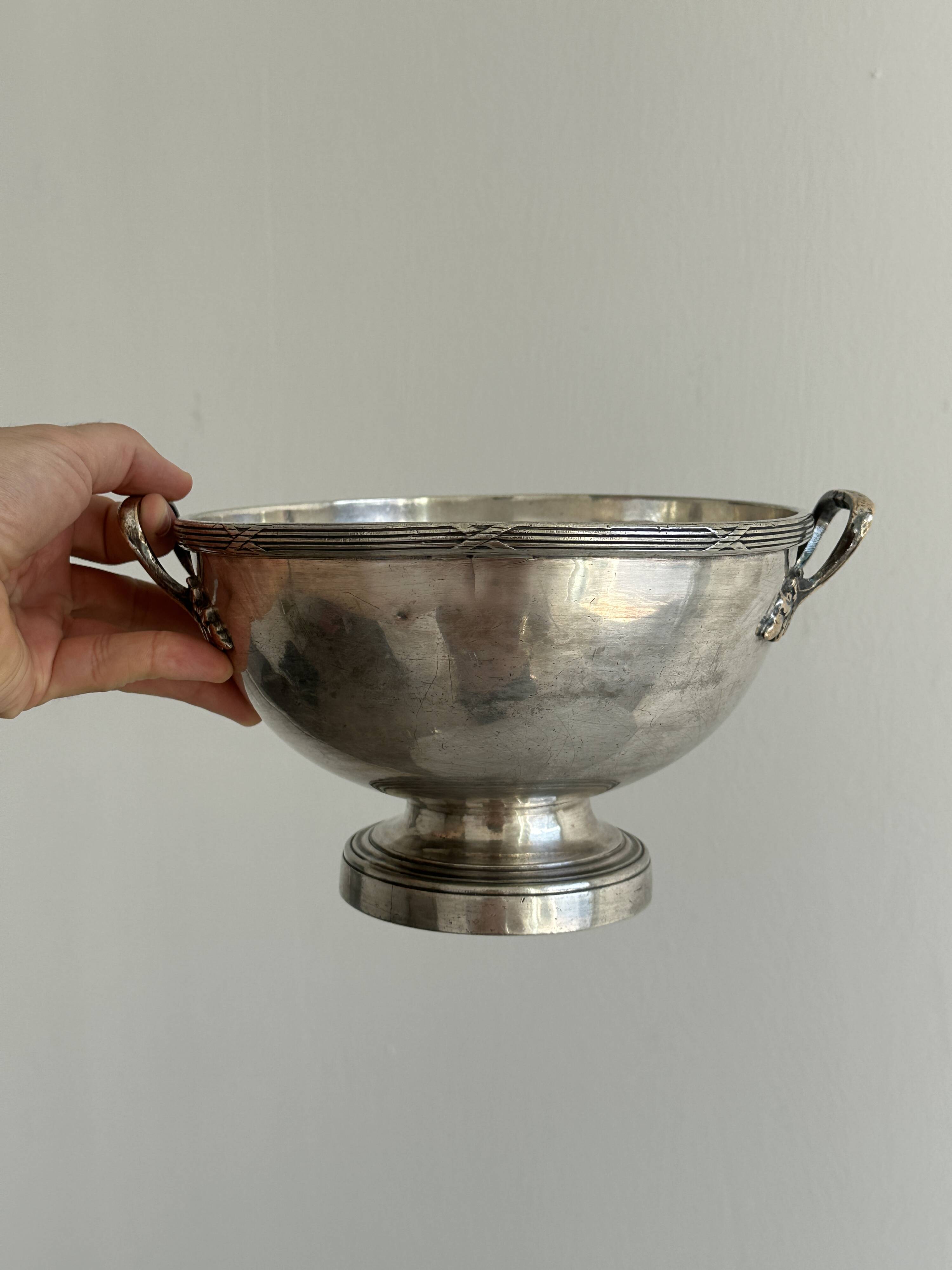 Metal salad bowl on foot