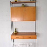 Omnia shelving system / self-supporting modular secretary desk in teak, dating from the 1960s.