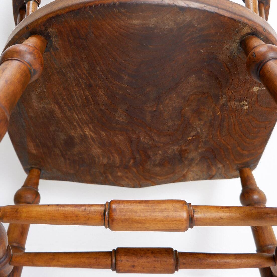 Elm armchair with curved back