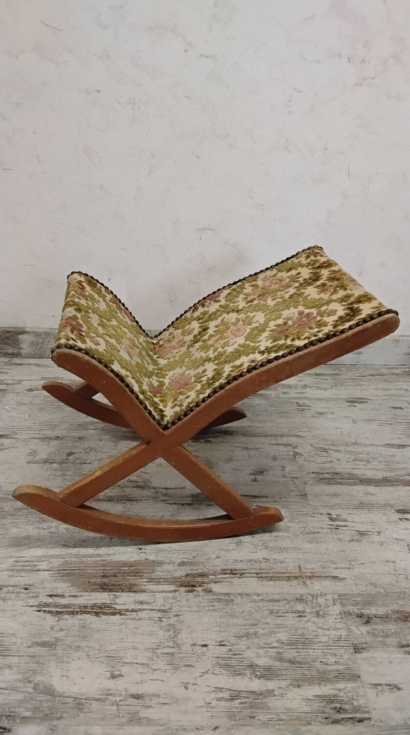 Antique rocking footrest