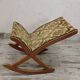 Antique rocking footrest