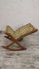 Antique rocking footrest