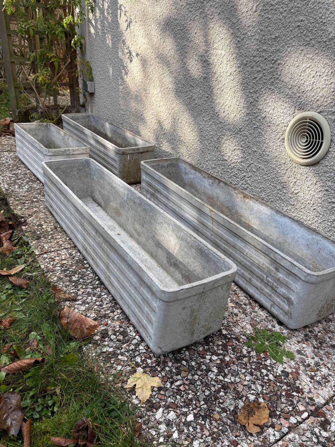 Set of 4 fibreglass planters by Willy Guhl