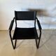 Set of 12 vintage black leather and tubular steel chairs – Italy, year