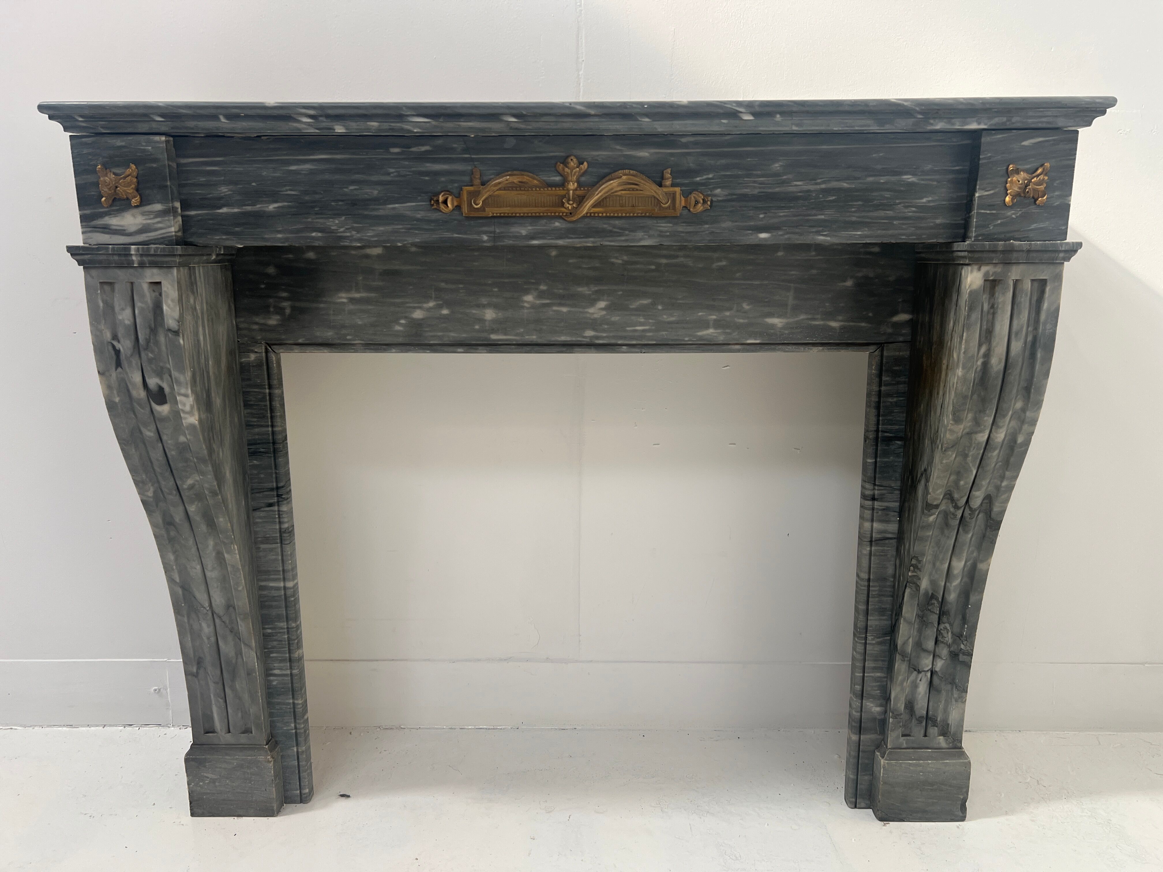 Napoleon III fireplace in blue Turquin marble from the 19th century.