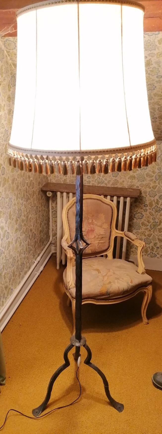Wrought iron floor lamp.