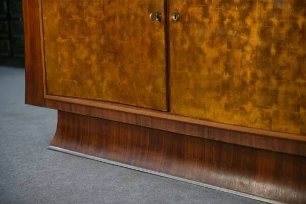 Art Deco rosewood sideboard with gilt door, attributed to Maison Dominique, 1940s