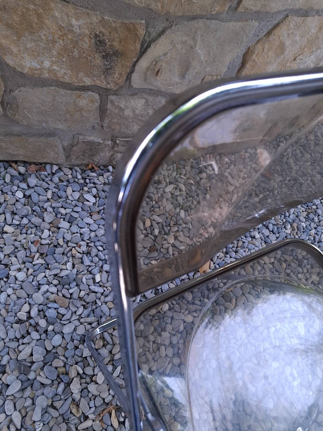 2 folding chairs designed by Giancarlo Piretti for Castelli