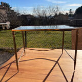 Brass side table with smoked glass.