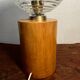 Cylindrical base lamp in solid wood and chiseled glass globe
