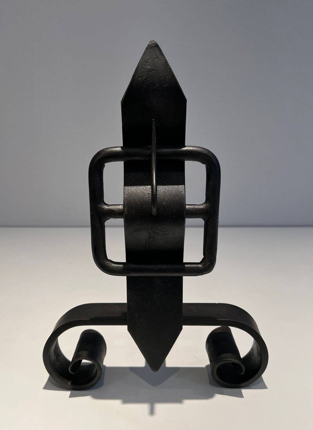 Pair of Wrought Iron Andirons with Obelisk and Belt Motifs