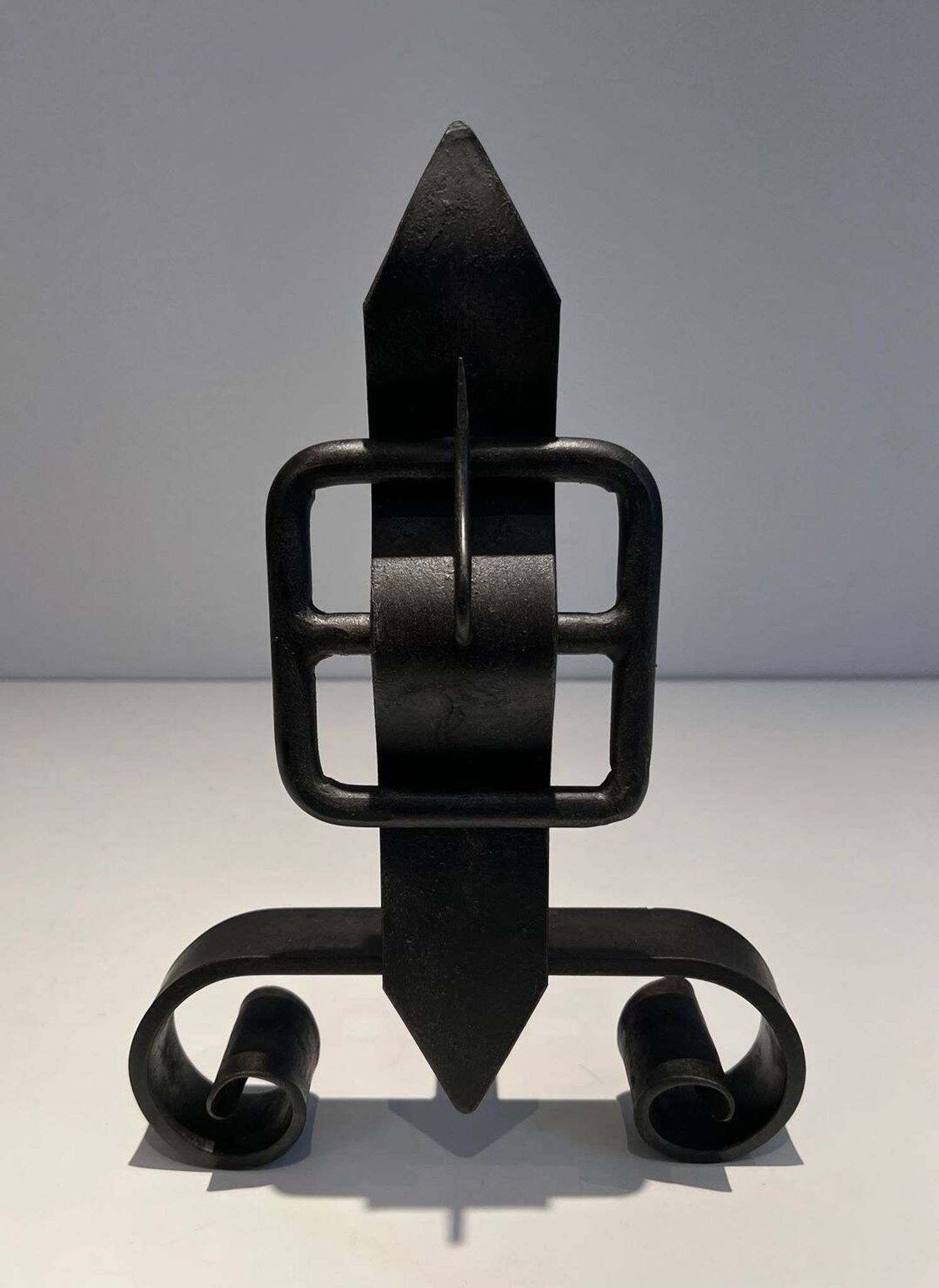 Pair of Wrought Iron Andirons with Obelisk and Belt Motifs
