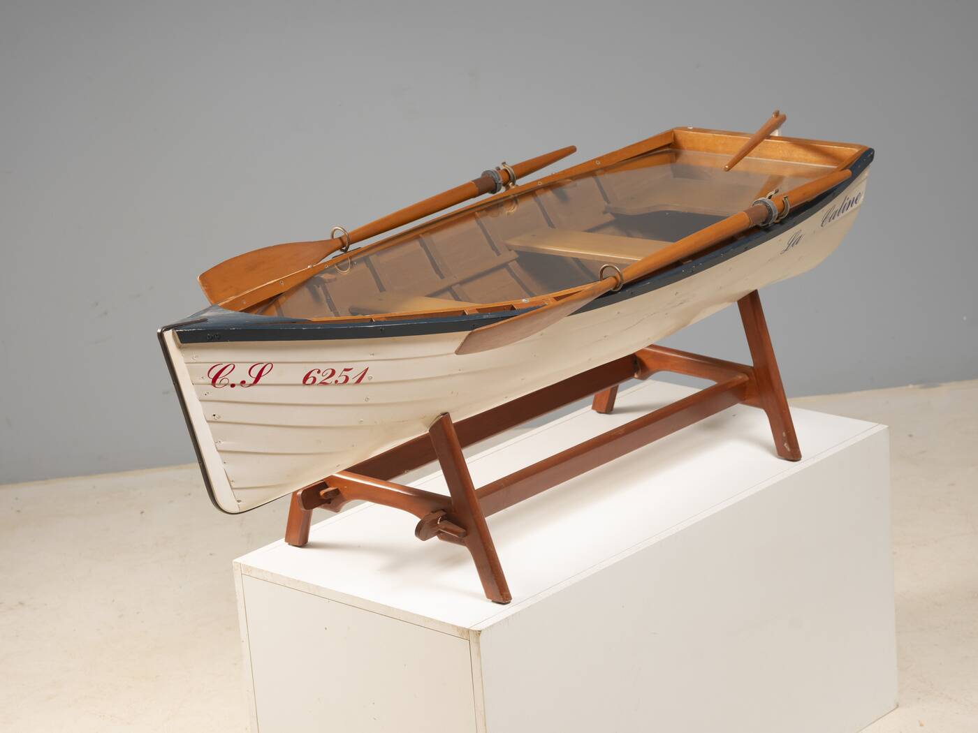 Boat-shaped coffee table reimagined with a glass top, contemporary design (after 2000)