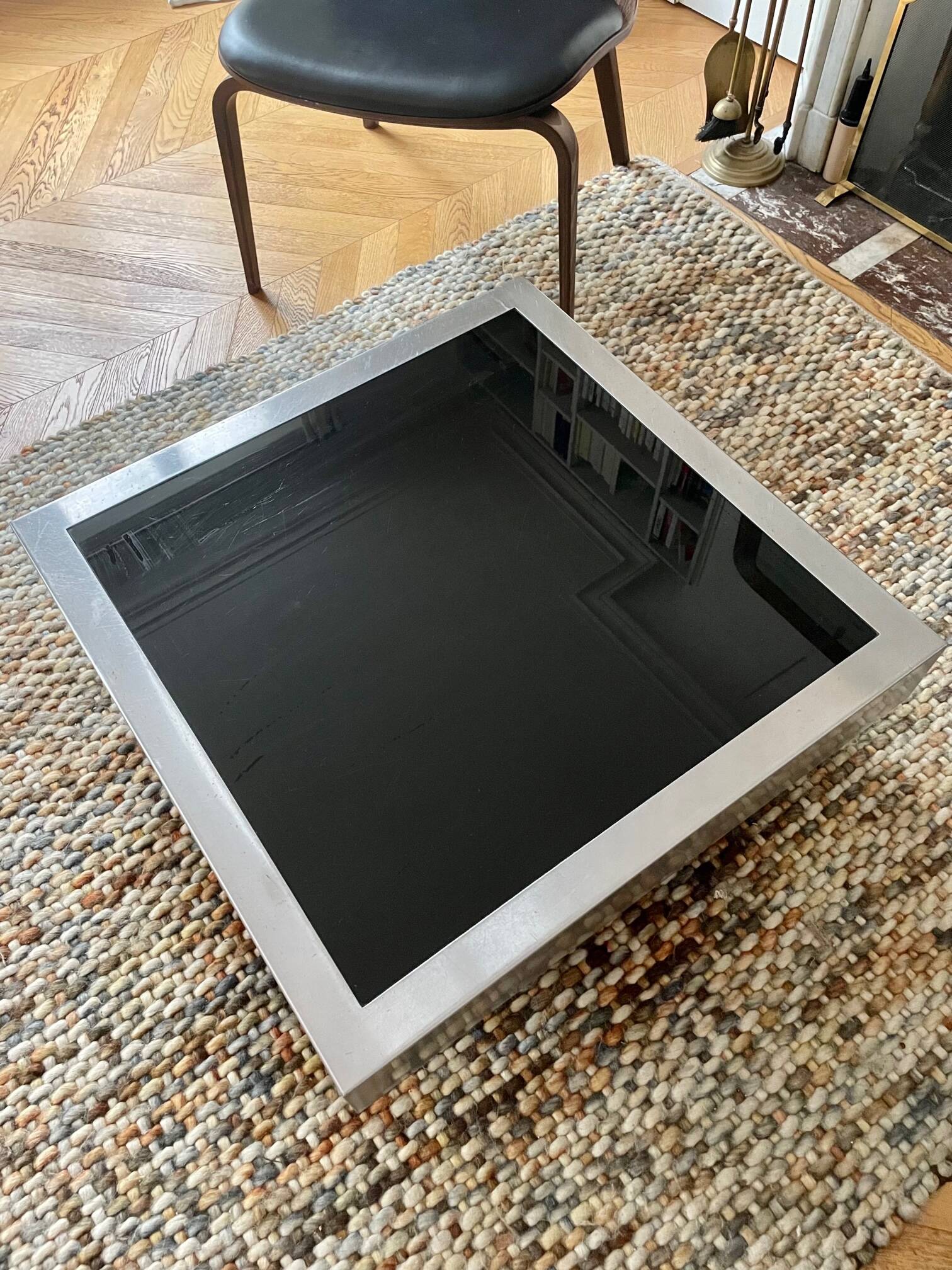 Coffee table – Black glass and brushed metal – 1970s