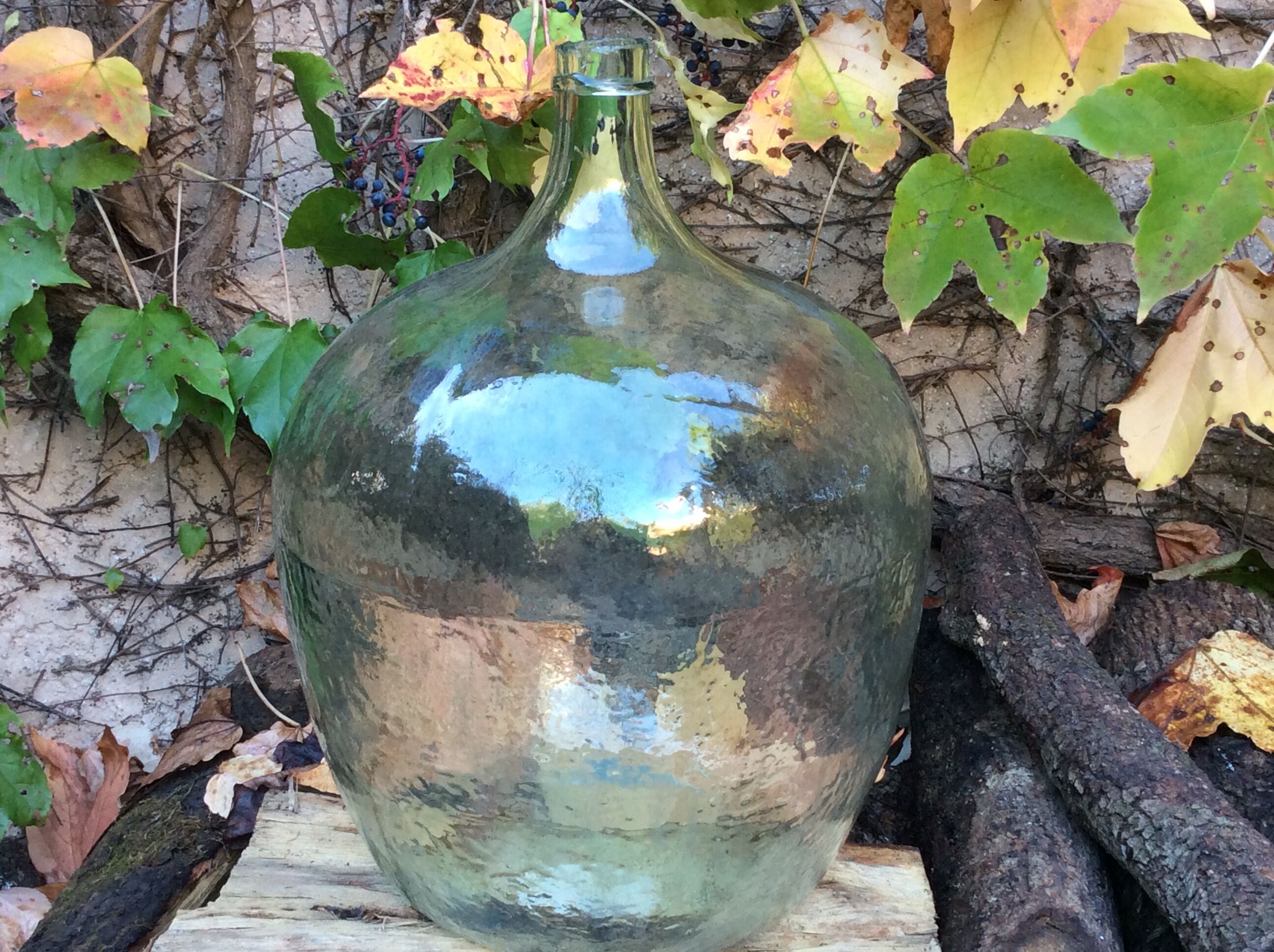 An old "Dame-jeanne" in blown glass, beginning of the nineteenth century