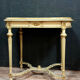 Guéridon d'apparat Louis XVI en bois laqué doré