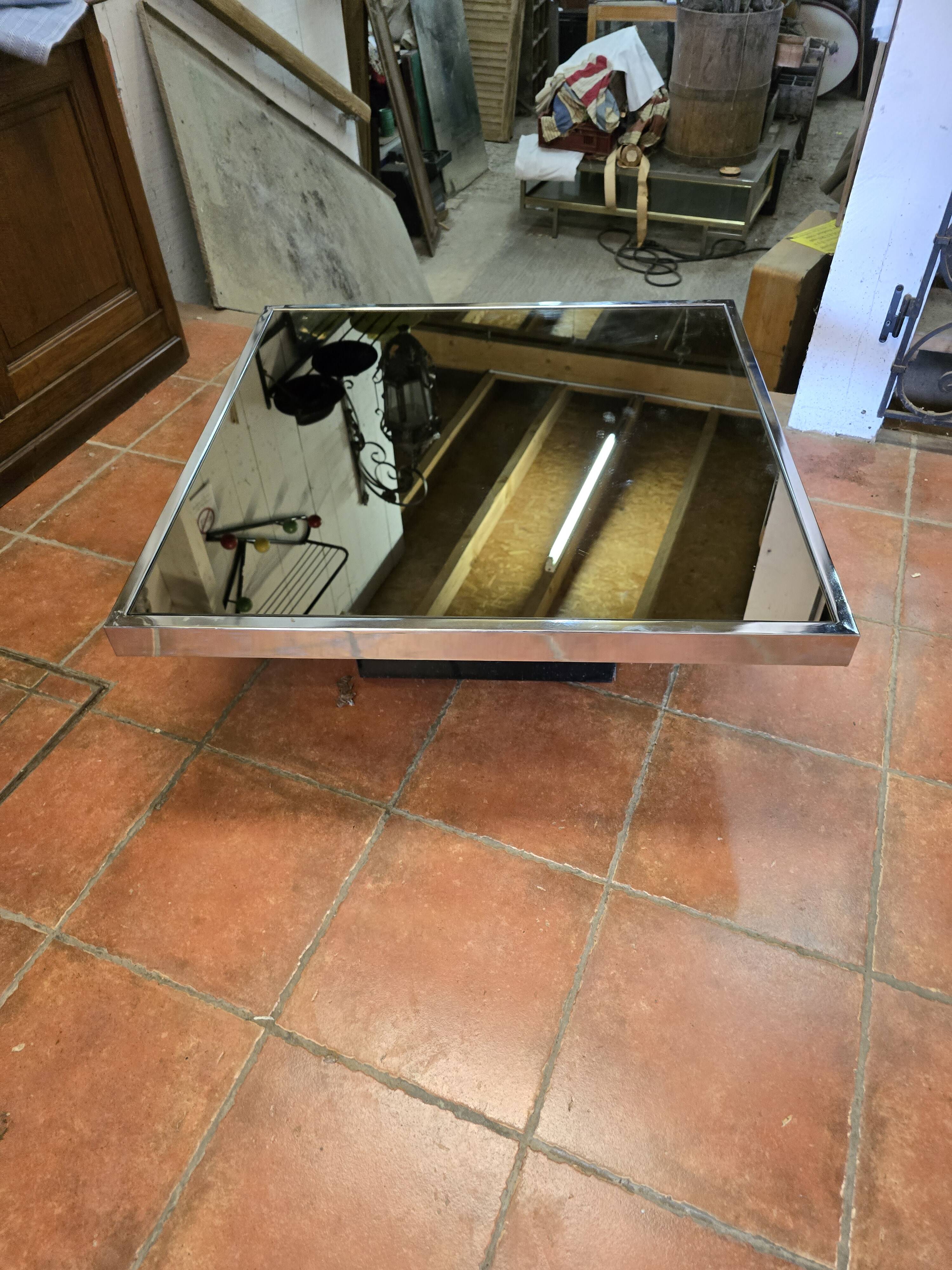 Chrome coffee table with smoked mirror top