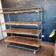 Steel and wooden shelf on wheels