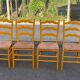 4 solid wood chairs with rush seats from the 1960s.