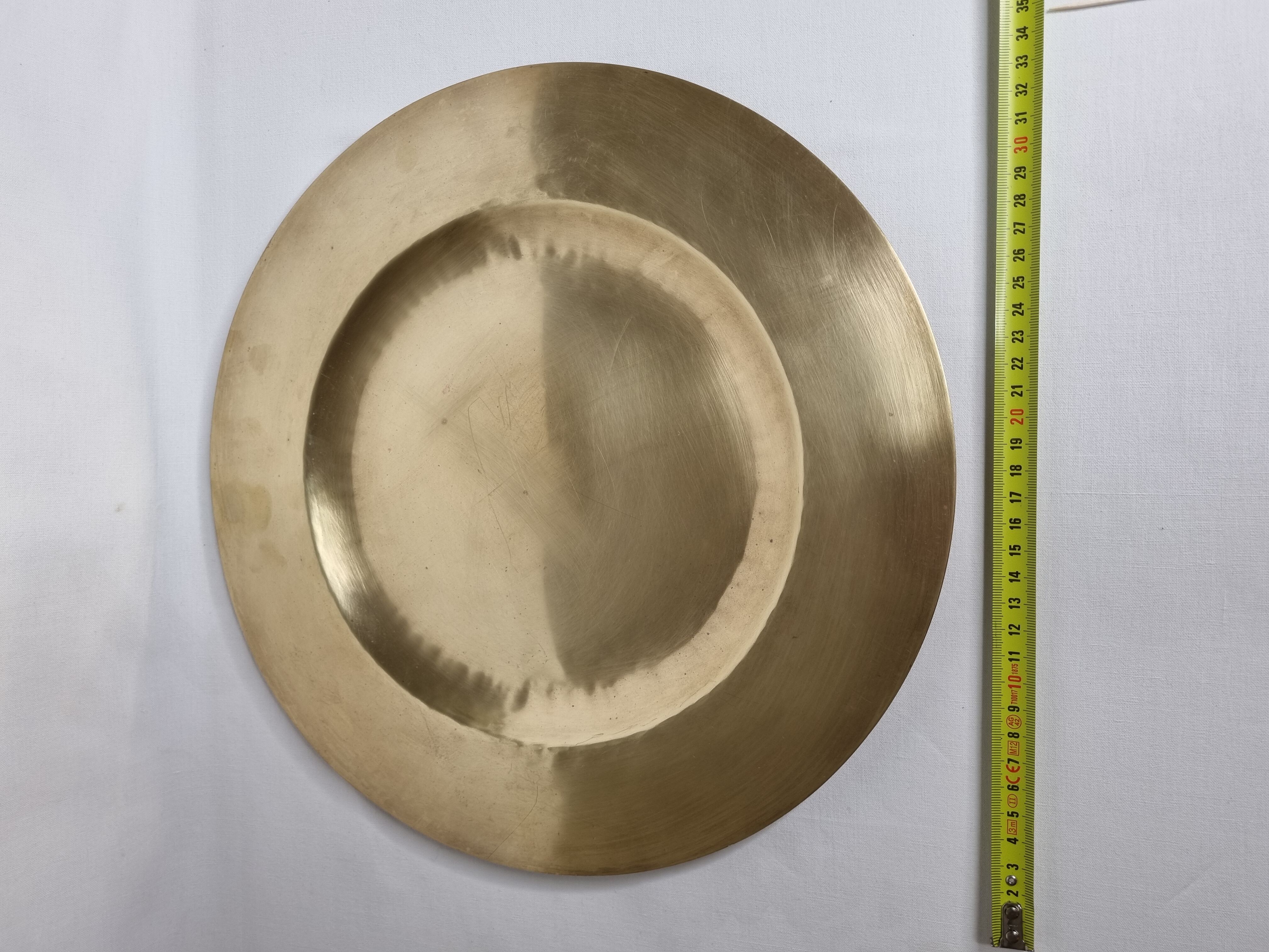 Two dishes in solid brass, 35 cm