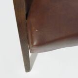 Pair of Scandinavian armchairs in brown leatherette and wood from the 50s and 60s