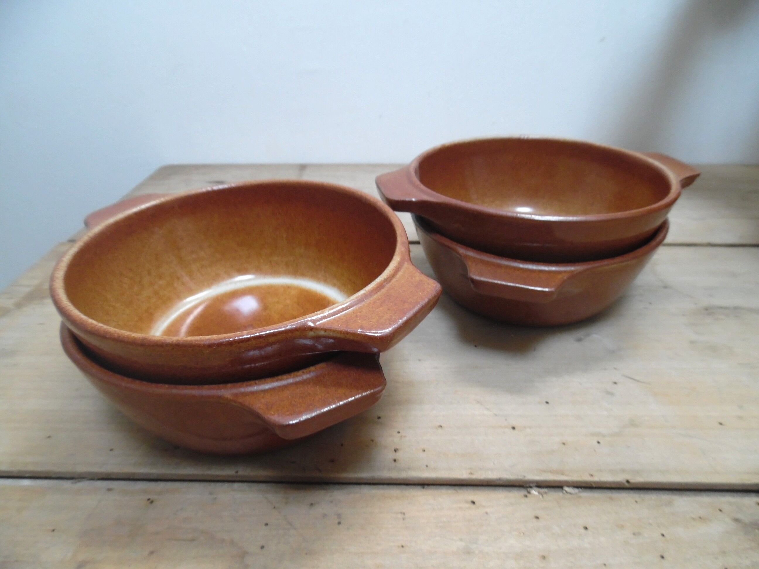 Set of soup plates to ears in sandstone