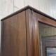 English walnut two-body library from the early 20th century.