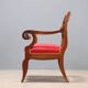 Antique Restoration-style armchair in walnut, fabric, Italy, 19th century.
