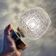 Vintage glass globe wall or ceiling light with diamond point.