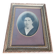 Old photo portrait framed in wood and stucco