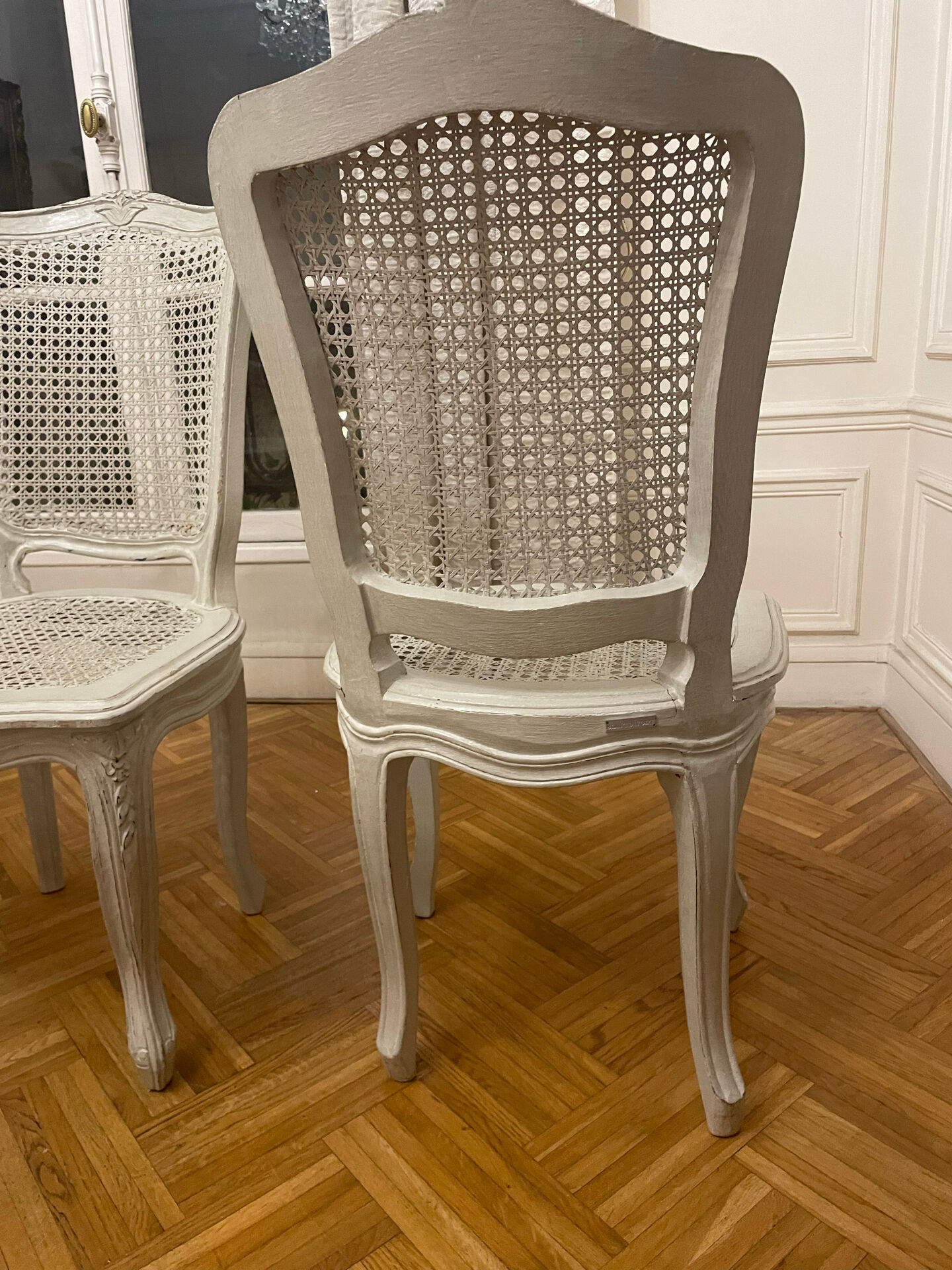 Set of 4 white caned chairs in Louis XV style.