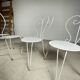 4 vintage wrought iron chairs