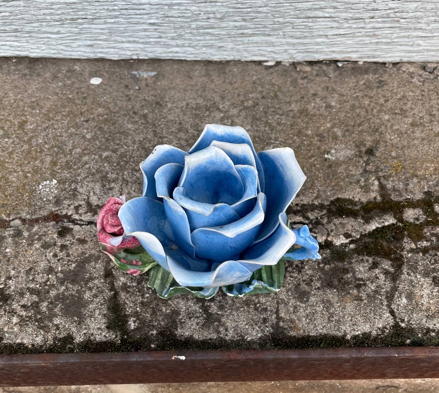 Old barbotine candle holder in the shape of a rose