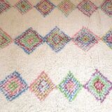 Pastel Béni Ouarain Berber rug with multi-colored Azilal patterns