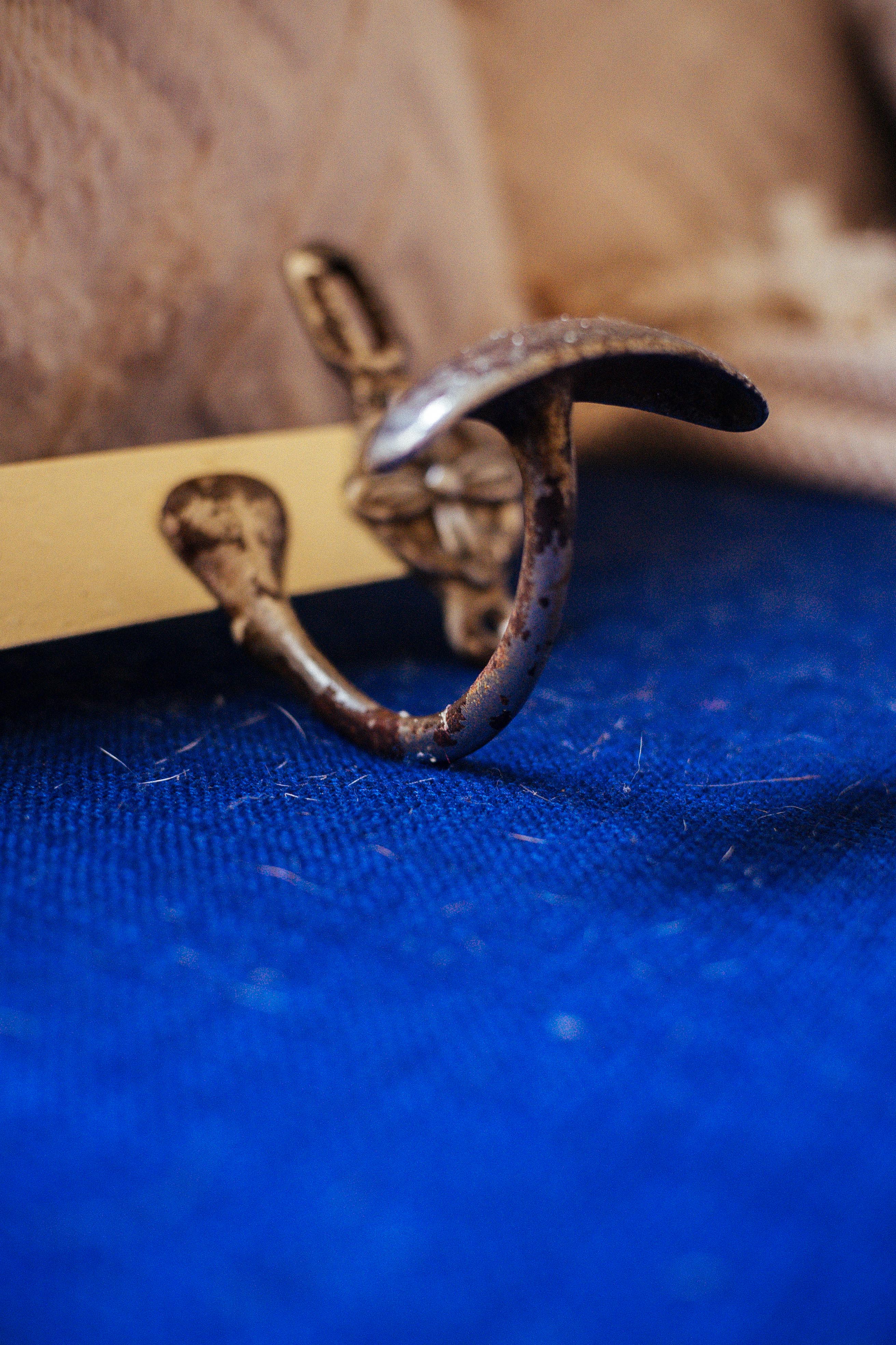 Antique wrought iron coat rack