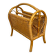 Vintage caramel-colored bamboo and rattan magazine rack