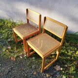 Pair of vintage varnished wood tanned chairs