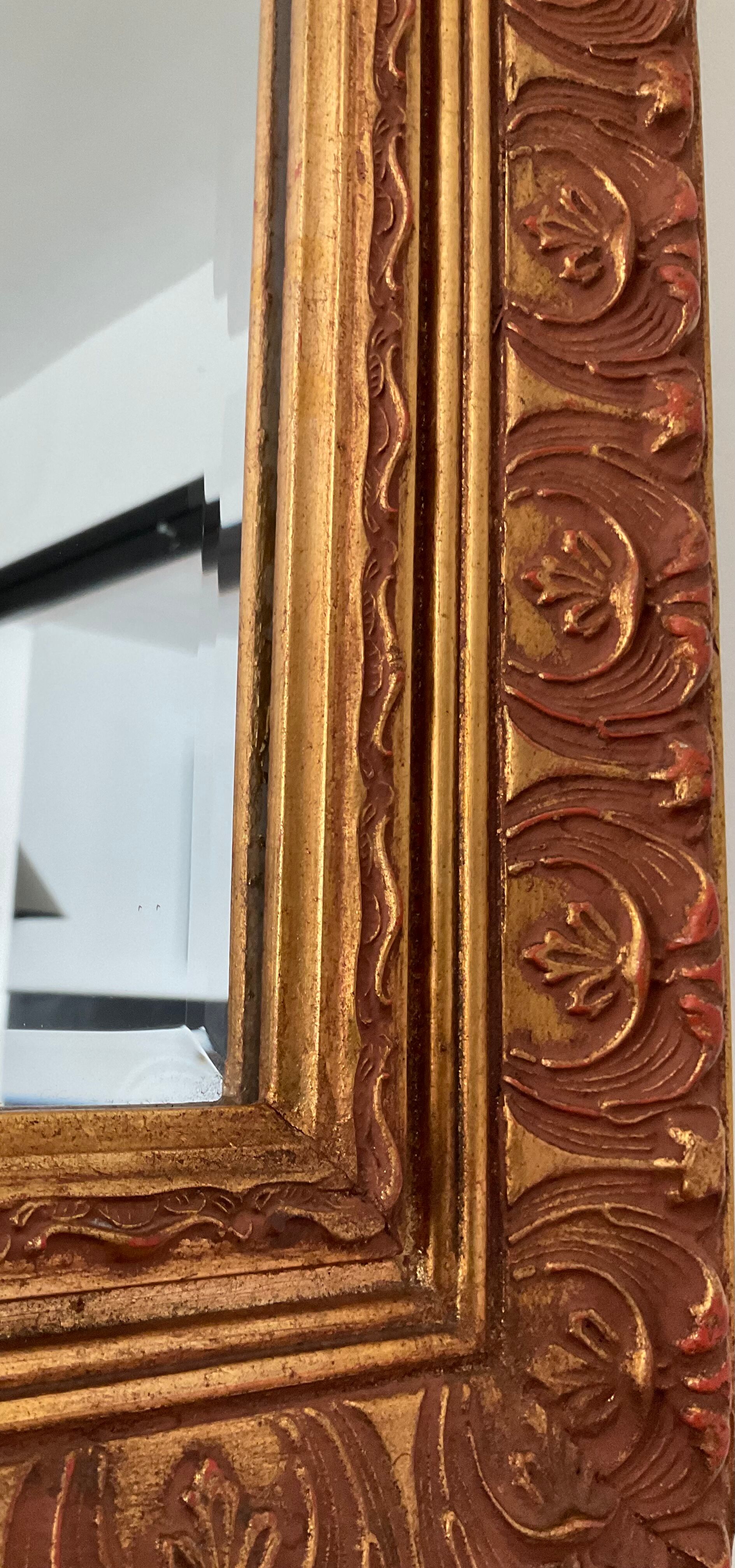 Old Beveled mirror in gilded wood