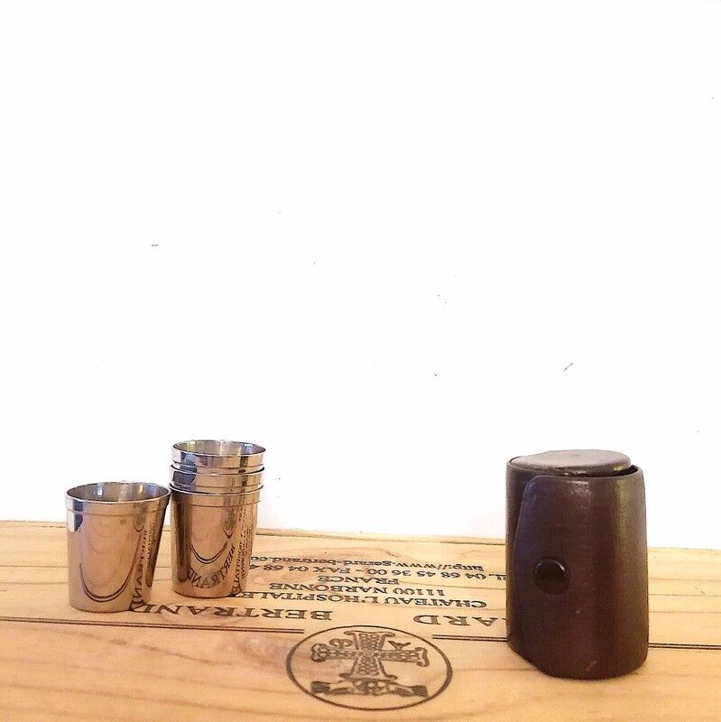 Liquor service in its leather case